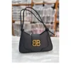 Fashion adjustable shoulder bag made of PU leather for daily use in black.