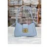 Fashion adjustable shoulder bag made of PU leather for daily use in light blue.