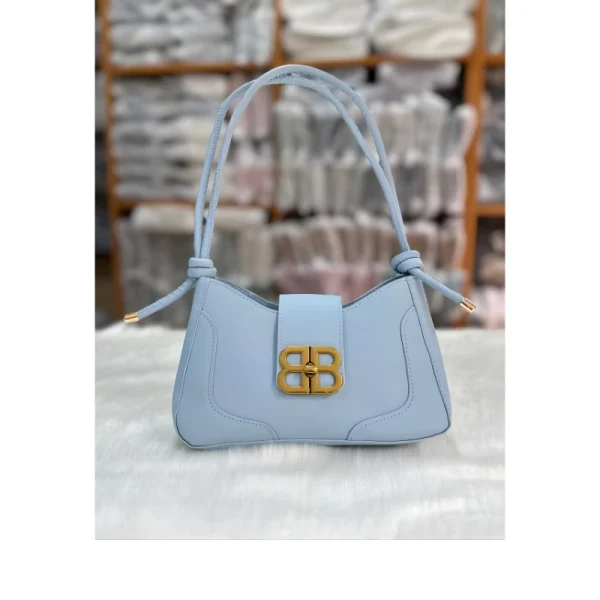 Fashion adjustable shoulder bag made of PU leather for daily use in light blue.