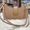 Adjustable shoulder bag for women made of PU leather with fashion design for everyday use in khaki