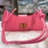 Adjustable PU leather shoulder bag with knot strap for daily use in pink