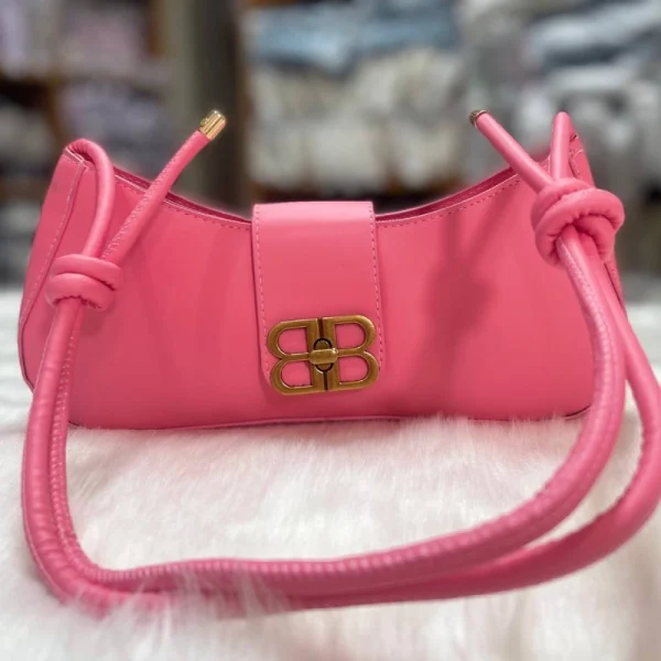 Adjustable PU leather shoulder bag with knot strap for daily use in pink