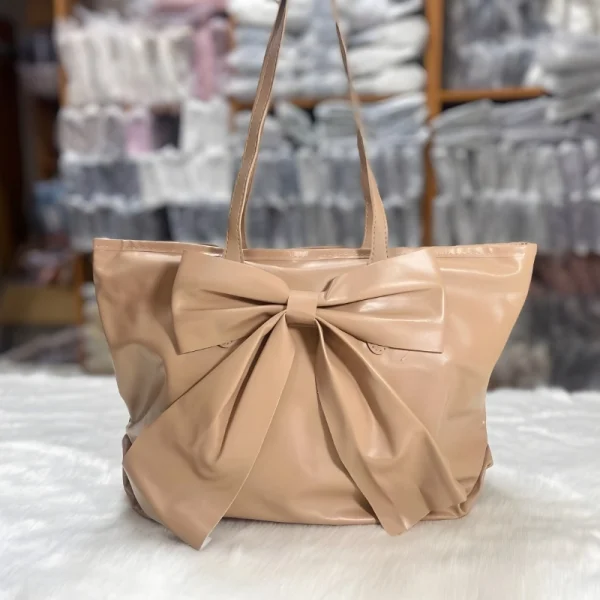 Large-capacity bow tote bag made of PU leather, fashionable design for daily use in khaki.