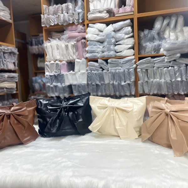 Large-capacity bow tote bag made of PU leather, fashionable design for daily use in multi color.