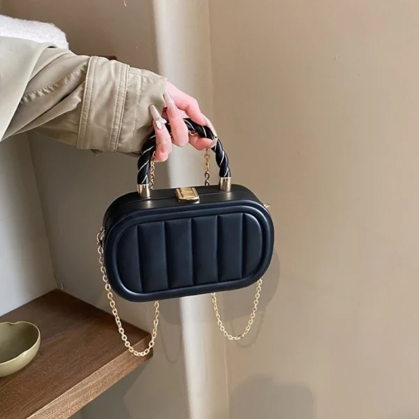 PU leather box bag with latch lock and fold design for casual outings in black