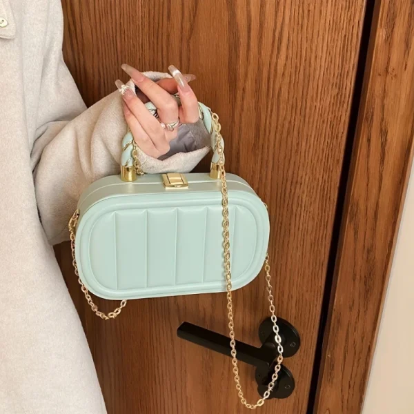 PU leather box bag with latch lock and fold design for casual outings in green