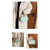 PU leather box bag with latch lock and fold design for casual outings in green outfit