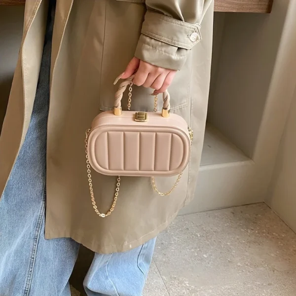 PU leather box bag with latch lock and fold design for casual outings in khaki