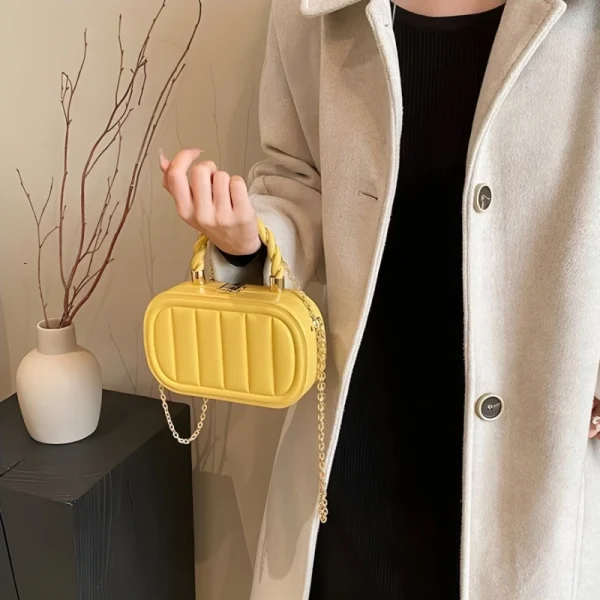 PU leather box bag with latch lock and fold design for casual outings in yellow