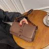 Brown faux leather crossbody shoulder bag with buckle strap for casual everyday use