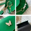 Green PU mini shoulder bag with butterfly decor and quilted embossed design for casual outings