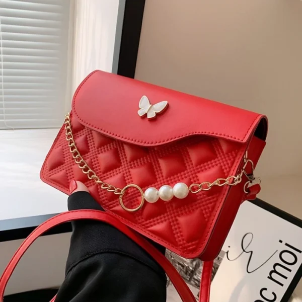 Red PU mini shoulder bag with butterfly decor and quilted embossed design for casual outings