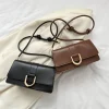 "Black and Brown PU leather casual shoulder bag with buckle flap design for everyday use"