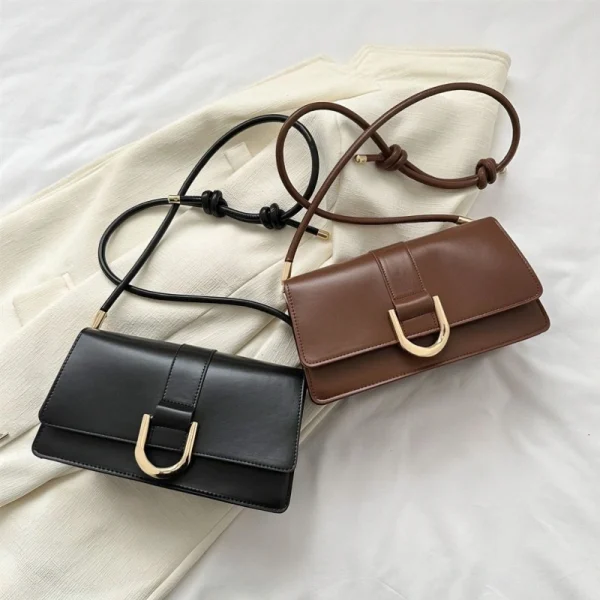 "Black and Brown PU leather casual shoulder bag with buckle flap design for everyday use"