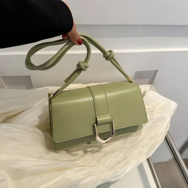 "Green PU leather casual shoulder bag with buckle flap design for everyday use"