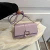 "Purple PU leather casual shoulder bag with buckle flap design for everyday use"