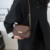 "PU leather commuter crossbody bag with metal lock for daily use in coffee outfit"
