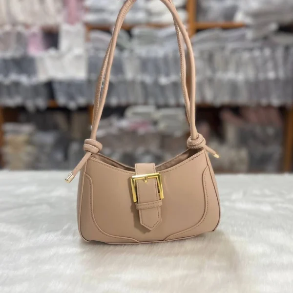 Compact women’s handbag in PU leather with buckle design for daily use, neutral beige color, perfect as shoulder or crossbody bag