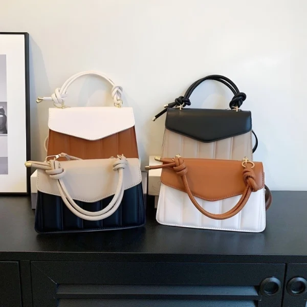 Women's fashion handbag made of PU leather with knotted handle, ideal for daily use in black, white and brown color