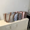 "Geometric pattern tote bag made of PU leather with waterproof build for daily use in multicolor"
