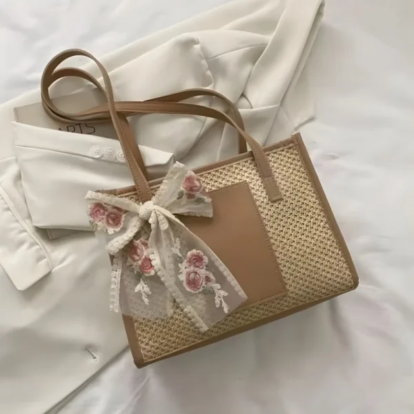 “Handwoven straw shoulder bag with polyester lining, large capacity for beach and travel use in khaki.”