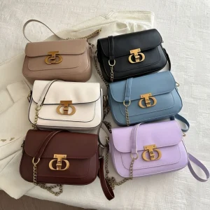 Korean small saddle bag made of PU with lock design, perfect for casual spring use in multicolor