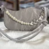 Pearl chain crossbody bag for women made of soft PU with stylish design for casual and evening use in silver