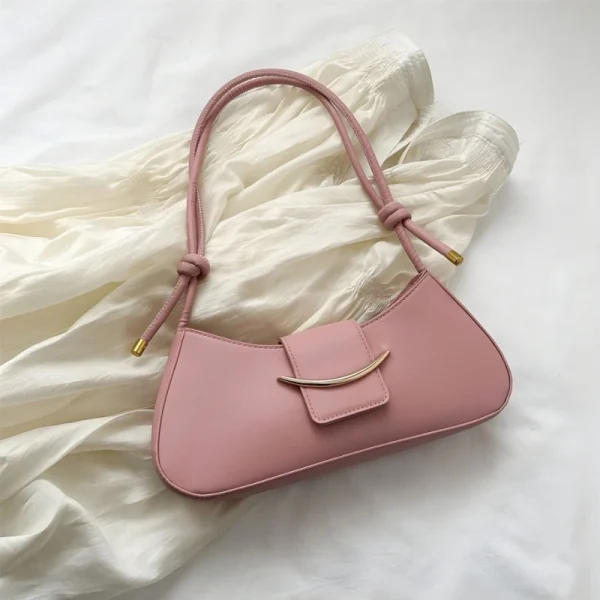 "Pink PU leather shoulder bag with zipper closure for everyday use"