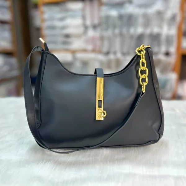 “PU leather hobo shoulder bag with buckle and chain design for daily use in black.”