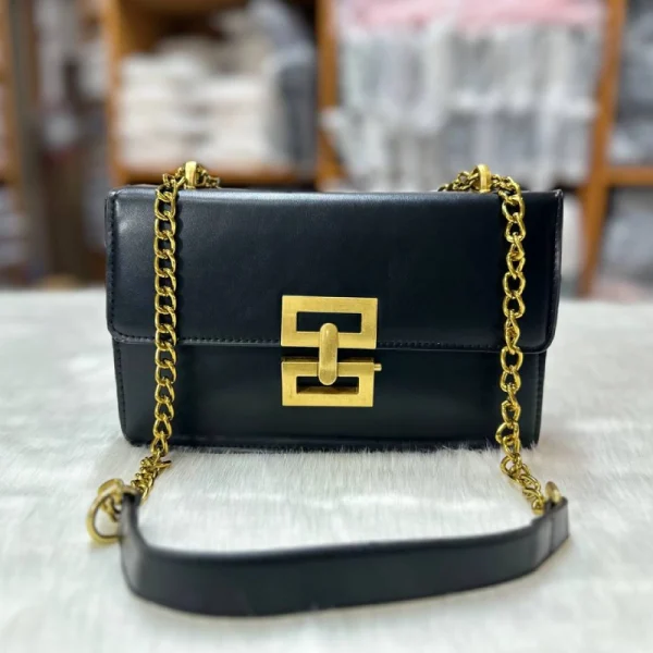 “PU leather shoulder handbag for women with golden chain, fashion-style design for daily use in black color.”