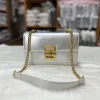 “PU leather shoulder handbag for women with golden chain, fashion-style design for daily use in silver color.”