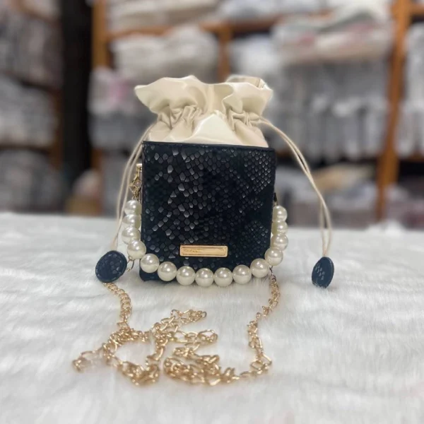 PU mini cube crossbody bag in black with pearl chain and compact stylish look for outings