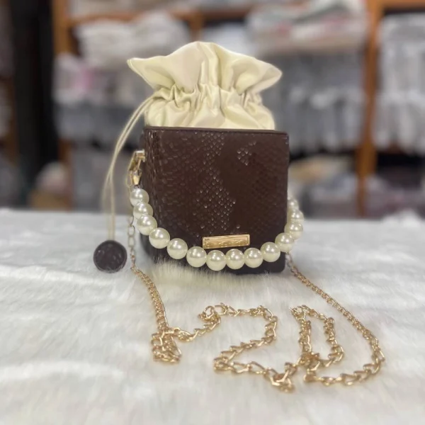 PU mini cube crossbody bag in coffee with pearl chain and compact stylish look for outings