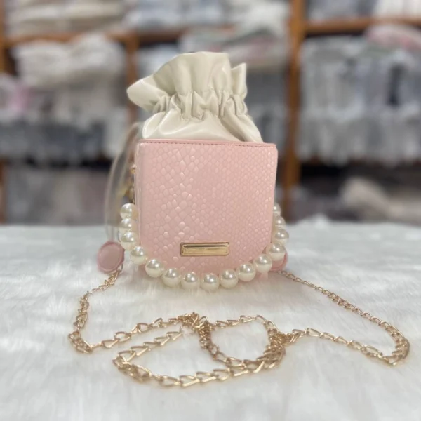 PU mini cube crossbody bag in pink with pearl chain and compact stylish look for outings
