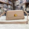 "Polyurethane shoulder bag with adjustable belt strap for wedding use in khaki"