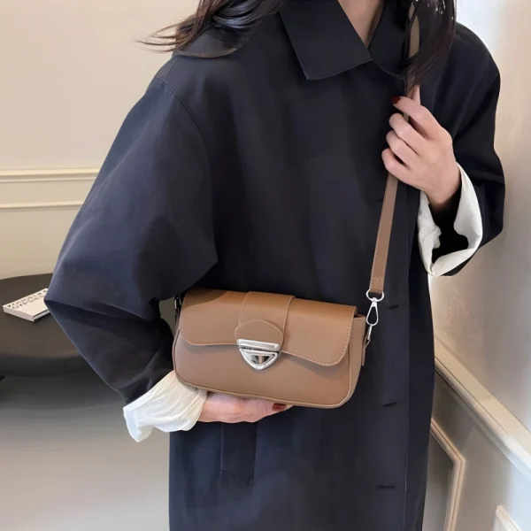 PU leather underarm shoulder bag with hasp closure for daily use in beige outfit