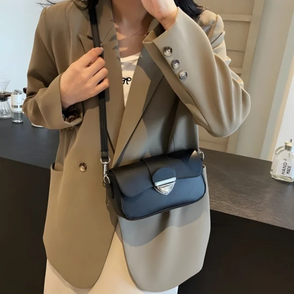PU leather underarm shoulder bag with hasp closure for daily use in black outfit