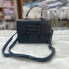 “Vegan leather handbag with stone pattern, PU material, stylish shoulder messenger design for daily use in black color.”