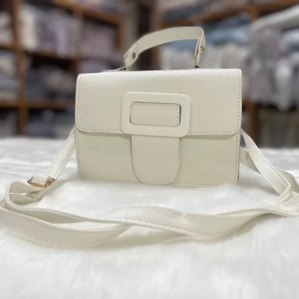 “Vegan leather handbag with stone pattern, PU material, stylish shoulder messenger design for daily use in white color.”
