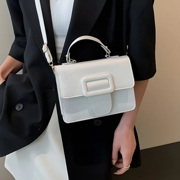 “Vegan leather handbag with stone pattern, PU material, stylish shoulder messenger design for daily use in white color.”