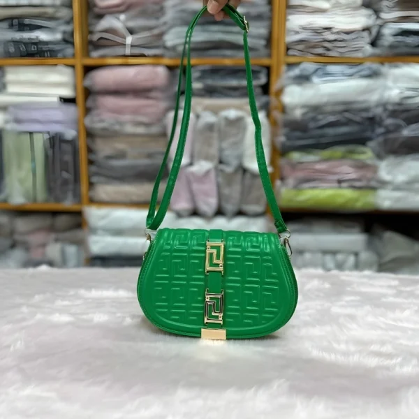Vintage PU crossbody bag with embossed pattern and chain detail for daily use in green