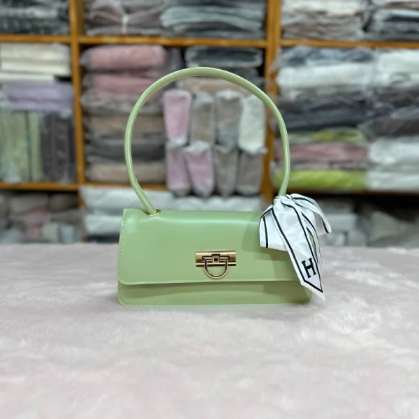“Vintage leather shoulder bag for women with buckle accent for all occasions in green.”