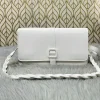 White faux leather crossbody shoulder bag with buckle strap for casual everyday use
