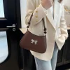 Fashionable women’s PU leather belt bag with adjustable handle and bow décor for everyday use in chocolate