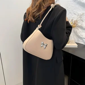 Fashionable women’s PU leather belt bag with adjustable handle and bow décor for everyday use in nude