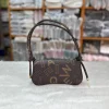 Women's crossbody bag made of PU leather with knot-style handle for trendy daily use in coffee & brown color