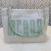 "Braided fabric women’s shoulder bag with lightweight braided texture for casual use in mint"