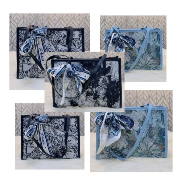 “Trendy women’s shoulder bag made of cloth with parrot-themed artistic design for casual outings in multi color