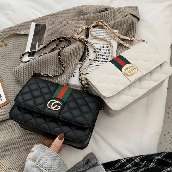 “Women’s PU shoulder bag with compact design for everyday use in black and white”