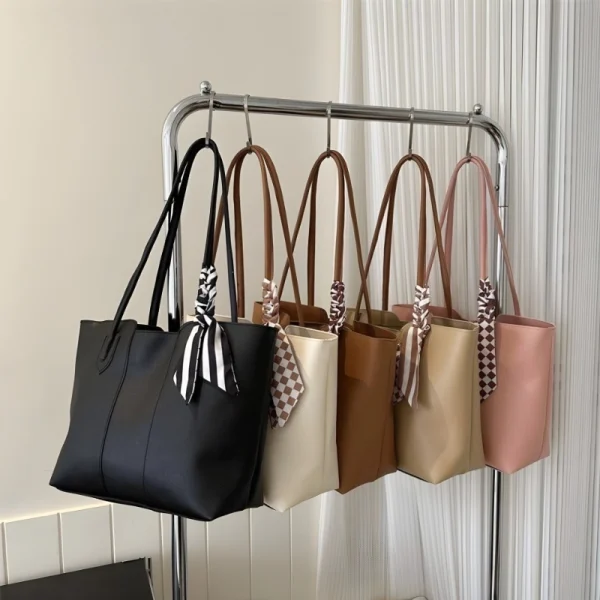 Women’s PU leather tote bag with large capacity for everyday use in brown white pink black color